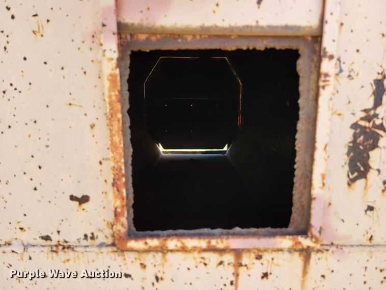 image for item DM8044 Wastequip  roll-off trash compactor dumpster