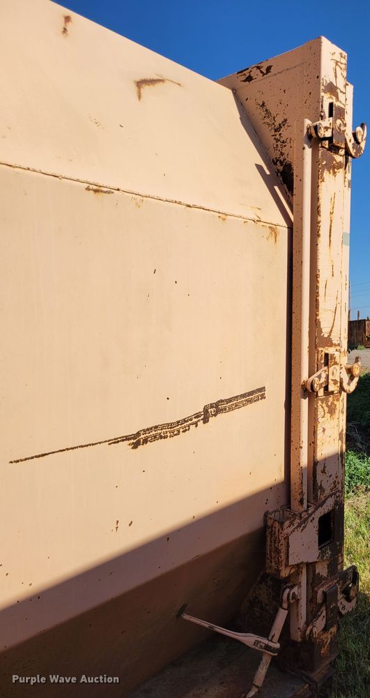 image for item DM8044 Wastequip  roll-off trash compactor dumpster