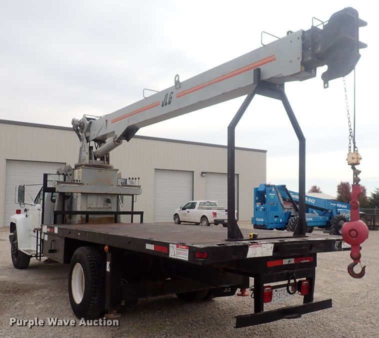 image for item DQ3083 1990 Ford F700  crane truck