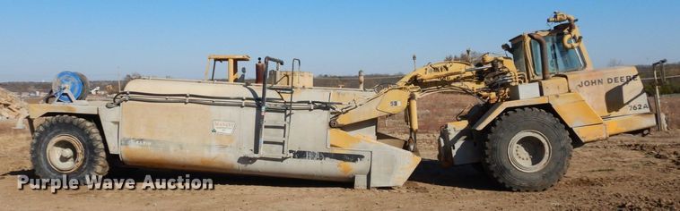 image for item DS1512 1984 John Deere 762A  water wagon