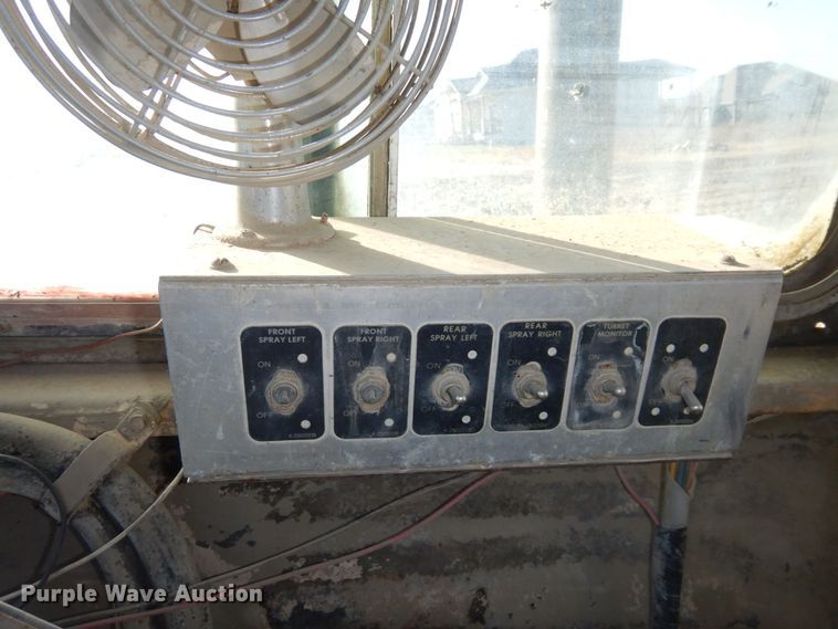 image for item DS1512 1984 John Deere 762A  water wagon