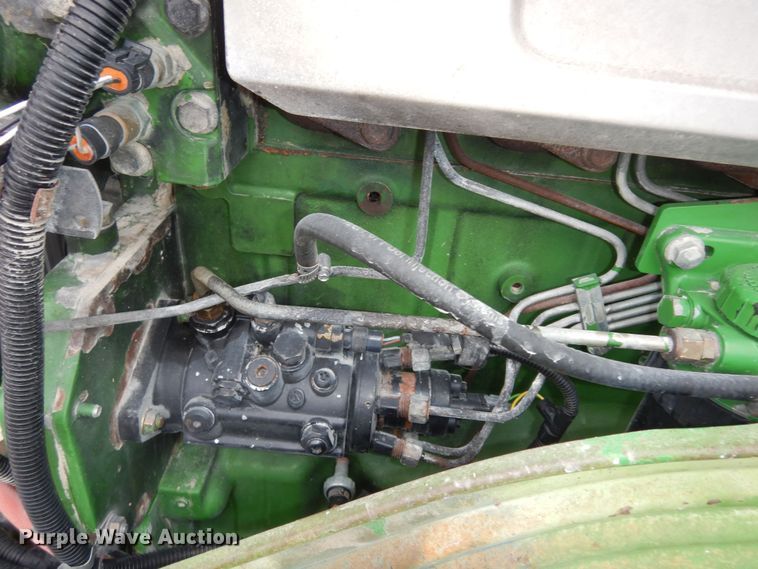image for item DI6886 2004 John Deere 6615  MFWD tractor