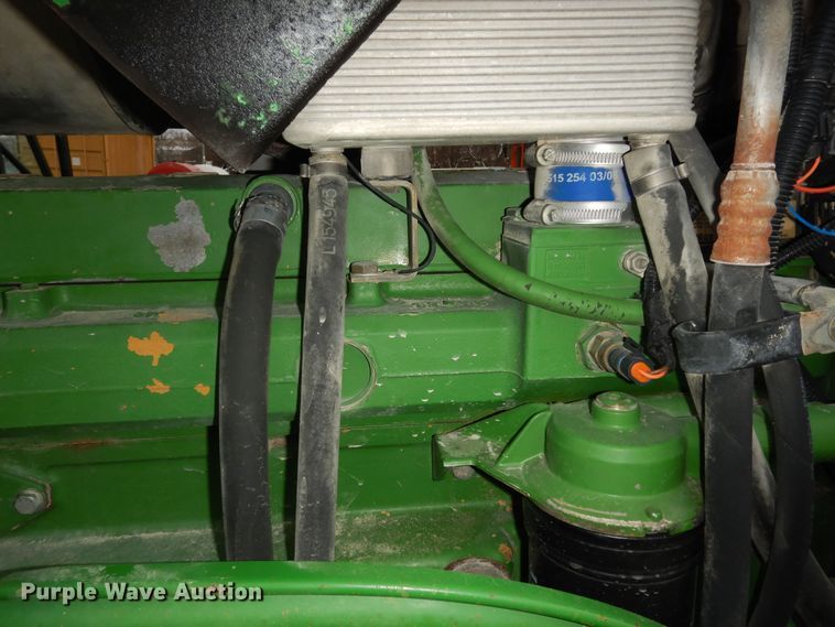 image for item DI6886 2004 John Deere 6615  MFWD tractor