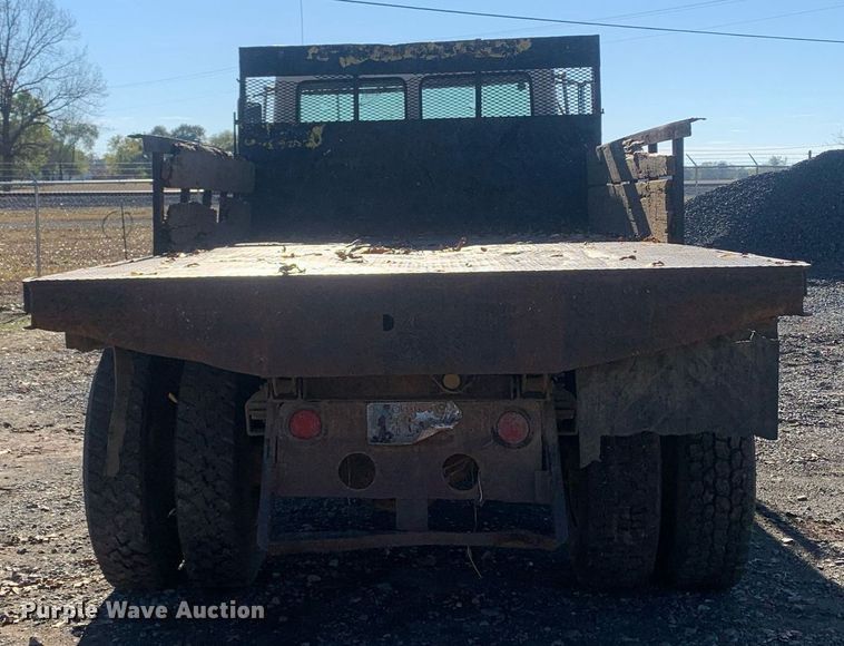 image for item MH9859 1999 Freightliner FL60 dump flatbed truck