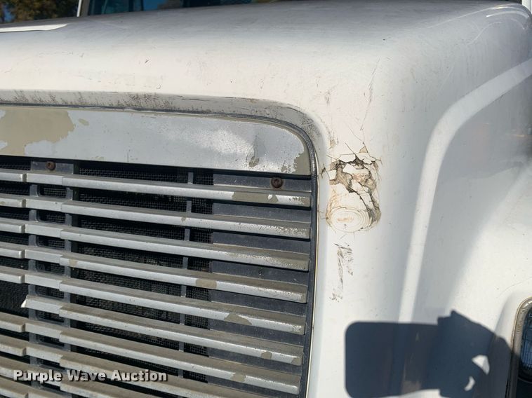 image for item MH9859 1999 Freightliner FL60 dump flatbed truck