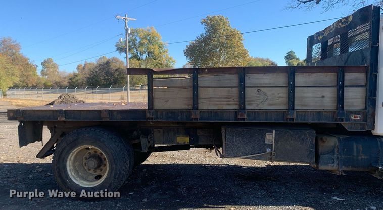 image for item MH9859 1999 Freightliner FL60 dump flatbed truck