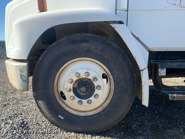 image for item MH9859 1999 Freightliner FL60 dump flatbed truck