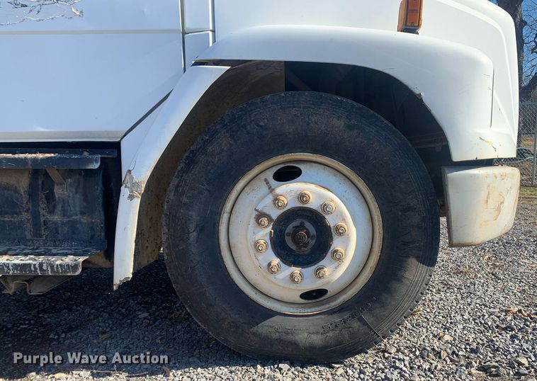 image for item MH9859 1999 Freightliner FL60 dump flatbed truck