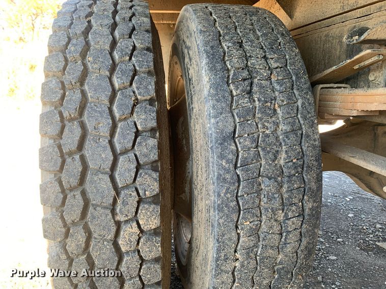 image for item MH9859 1999 Freightliner FL60 dump flatbed truck