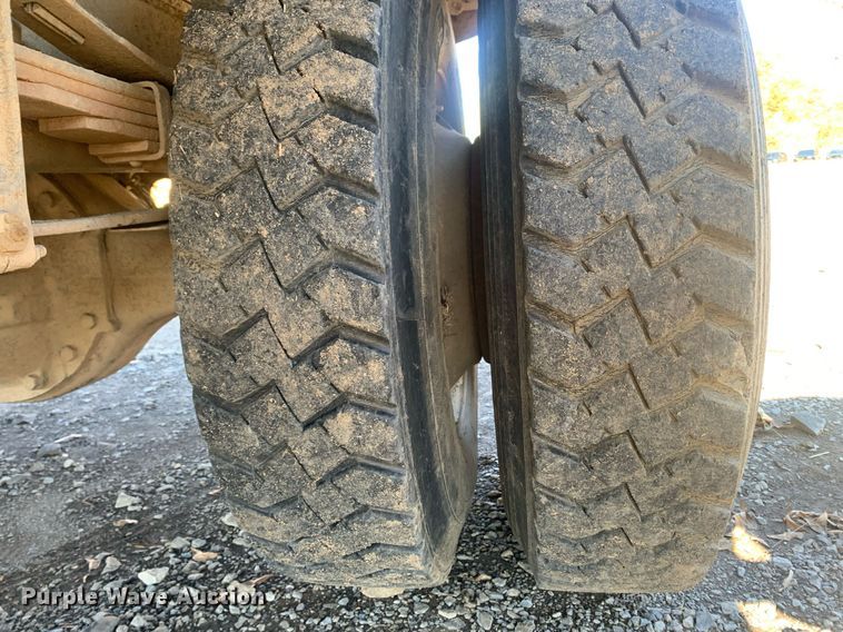 image for item MH9859 1999 Freightliner FL60 dump flatbed truck