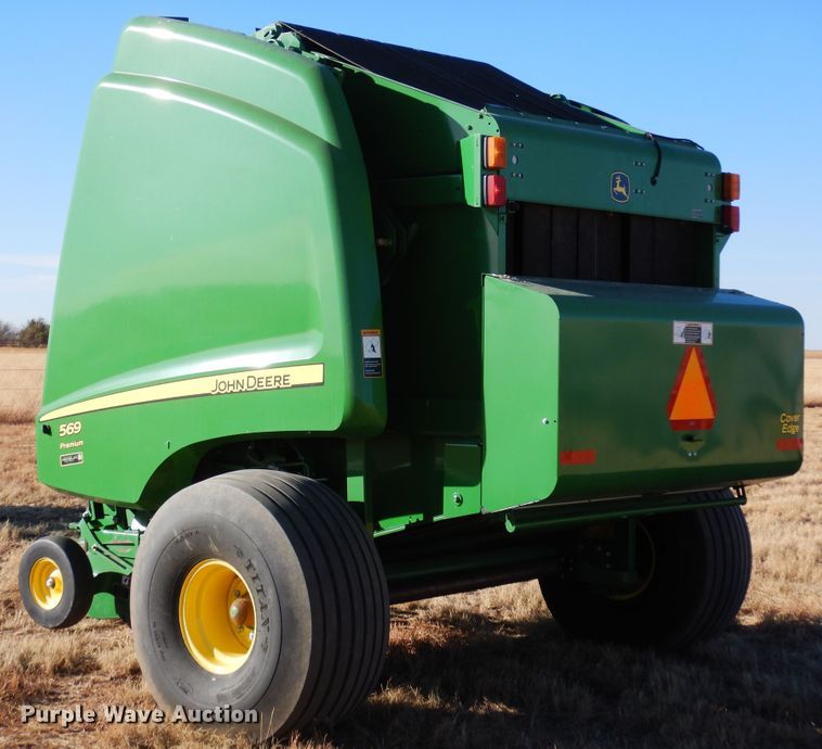 image for item DF8210 2014 John Deere 569 Premium  round baler