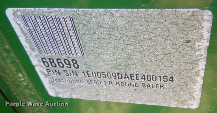 image for item DF8210 2014 John Deere 569 Premium  round baler