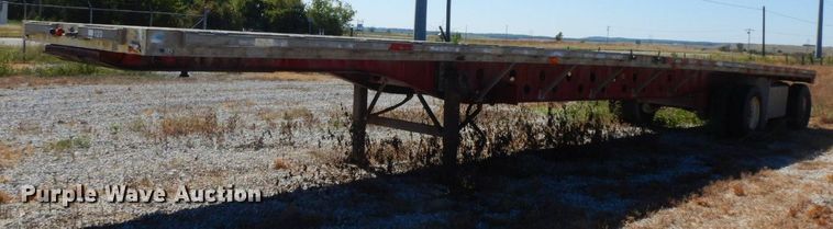 image for item HF9385 1998 Transcraft  flatbed trailer
