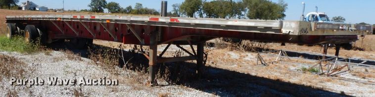 image for item HF9385 1998 Transcraft  flatbed trailer