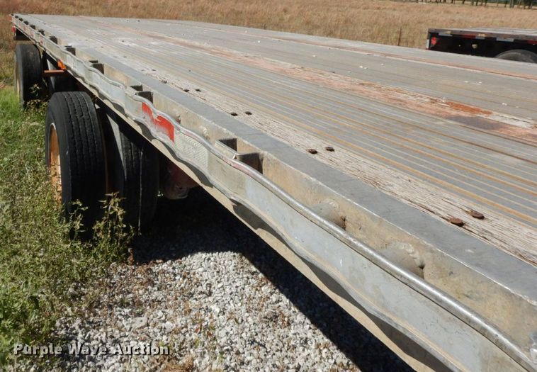 image for item HF9385 1998 Transcraft  flatbed trailer