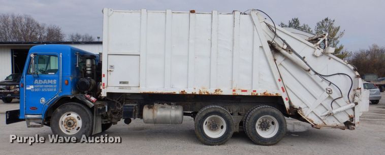 image for item MJ9841 2003 Peterbilt 320  refuse truck