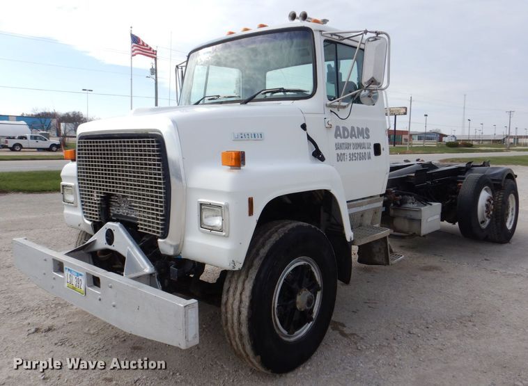 image for item MJ9842 1996 Ford L8000  hook lift truck