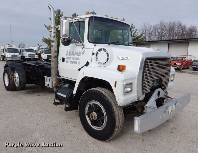 image for item MJ9842 1996 Ford L8000  hook lift truck
