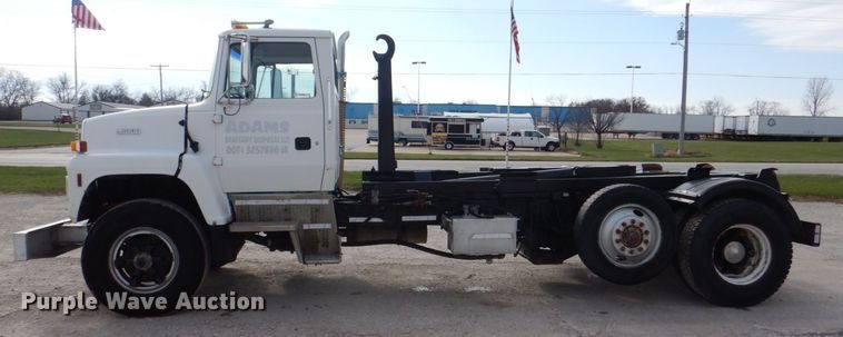 image for item MJ9842 1996 Ford L8000  hook lift truck