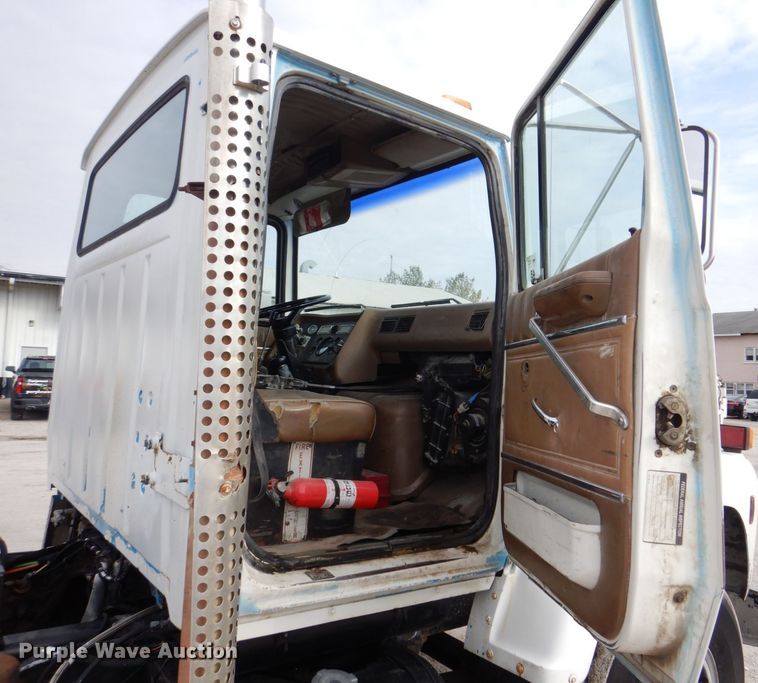 image for item MJ9842 1996 Ford L8000  hook lift truck