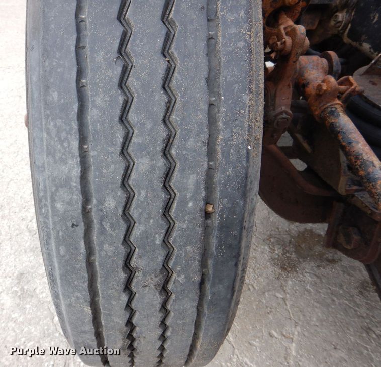 image for item MJ9842 1996 Ford L8000  hook lift truck