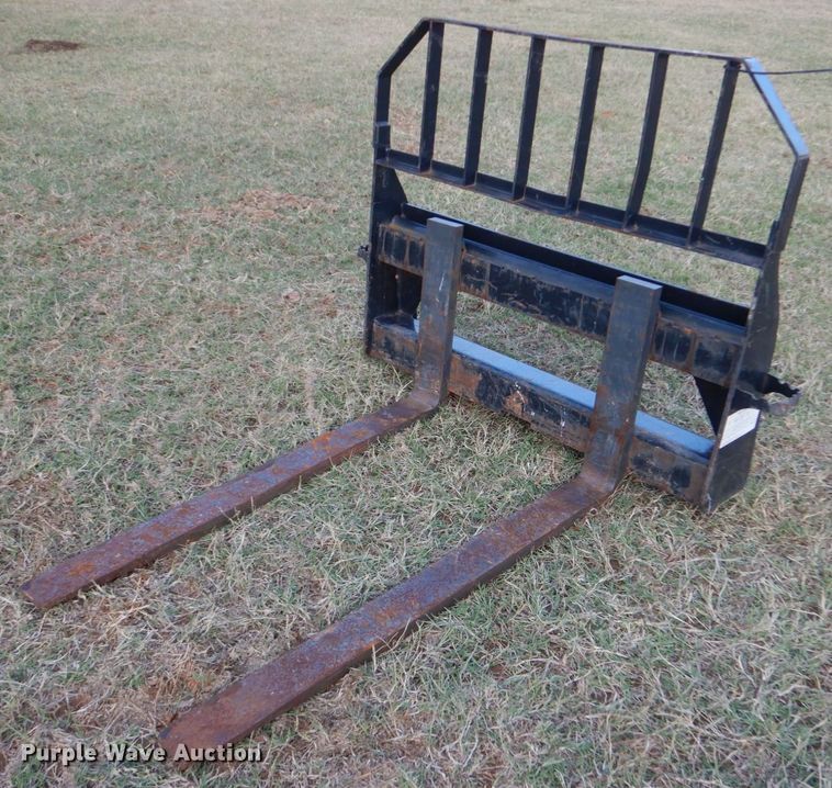 image for item LS9925 John Deere Worksite Pro  skid steer forks