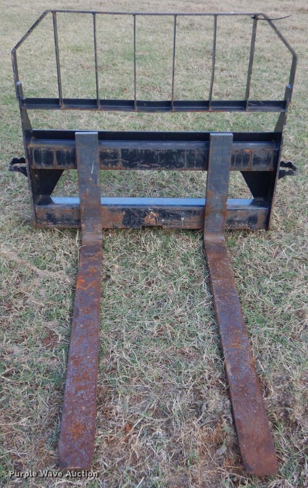 image for item LS9925 John Deere Worksite Pro  skid steer forks