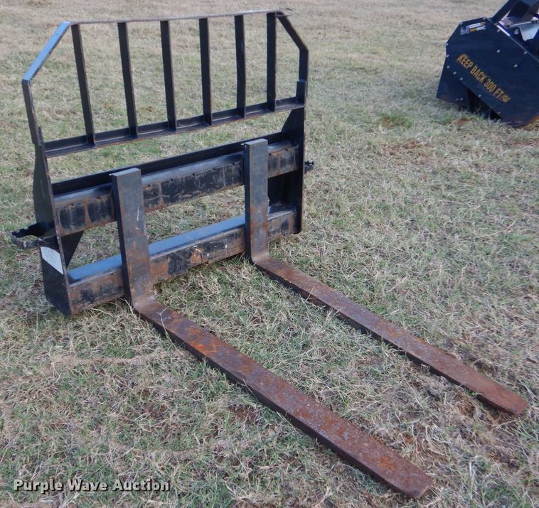 image for item LS9925 John Deere Worksite Pro  skid steer forks