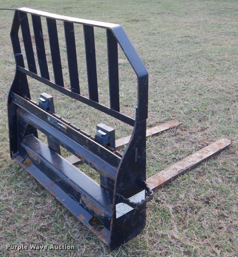 image for item LS9925 John Deere Worksite Pro  skid steer forks