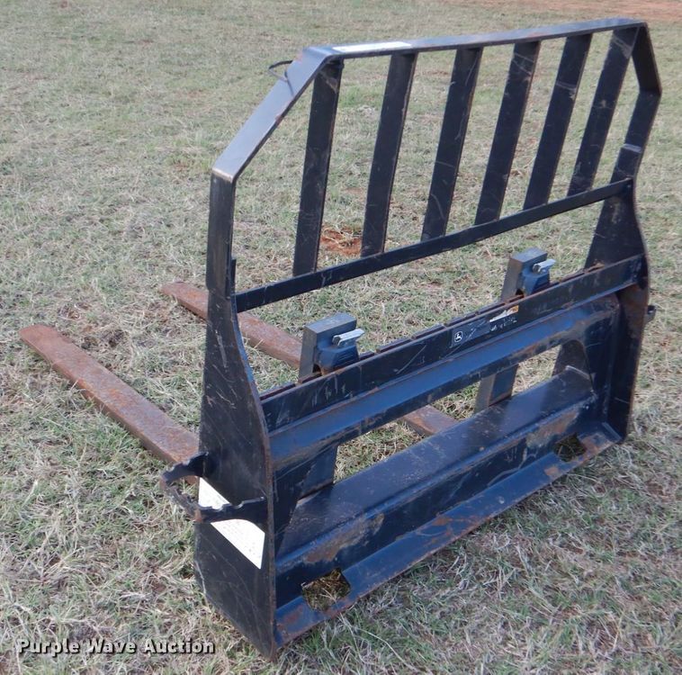 image for item LS9925 John Deere Worksite Pro  skid steer forks