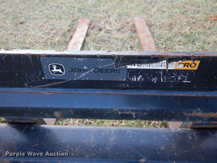 image for item LS9925 John Deere Worksite Pro  skid steer forks