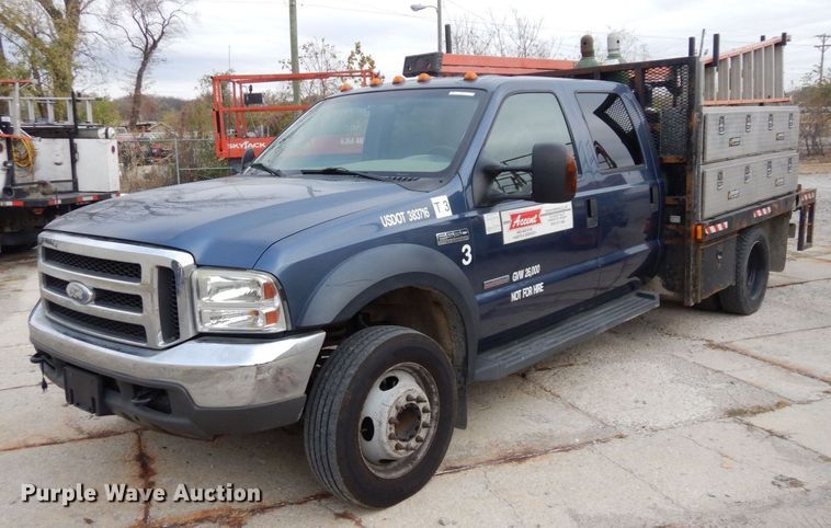 image for item JK9018 2006 Ford F550 Super Duty XLT  Crew Cab flatbed truck