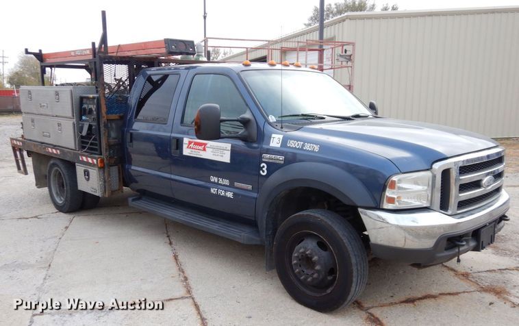 image for item JK9018 2006 Ford F550 Super Duty XLT  Crew Cab flatbed truck