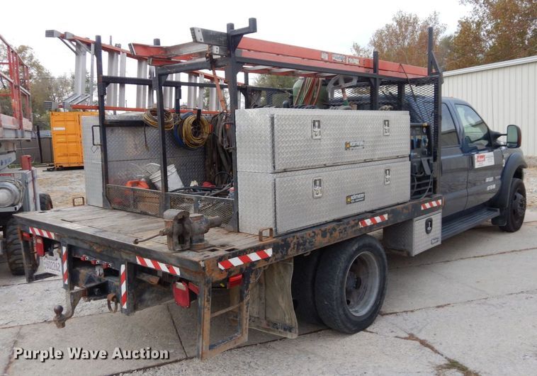 image for item JK9018 2006 Ford F550 Super Duty XLT  Crew Cab flatbed truck