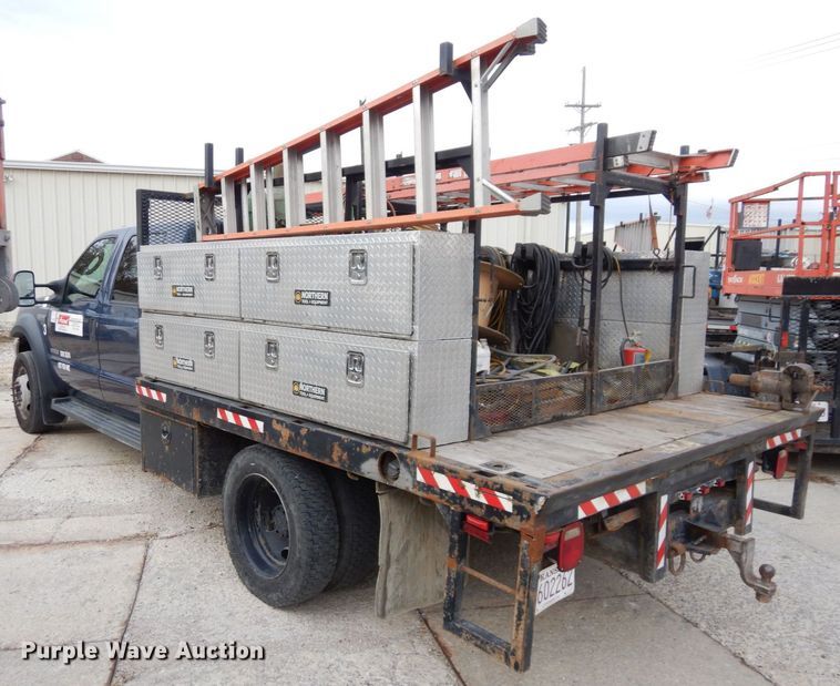 image for item JK9018 2006 Ford F550 Super Duty XLT  Crew Cab flatbed truck