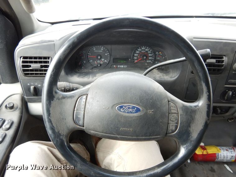 image for item JK9018 2006 Ford F550 Super Duty XLT  Crew Cab flatbed truck