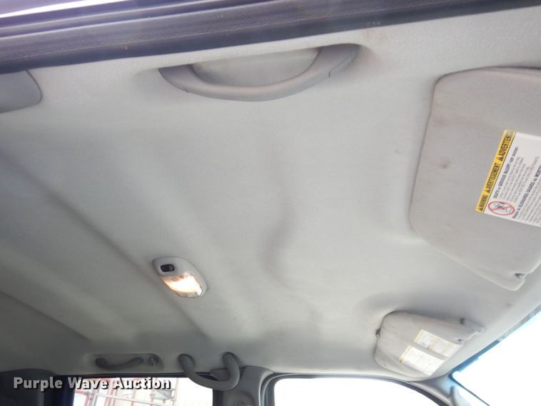 image for item JK9018 2006 Ford F550 Super Duty XLT  Crew Cab flatbed truck