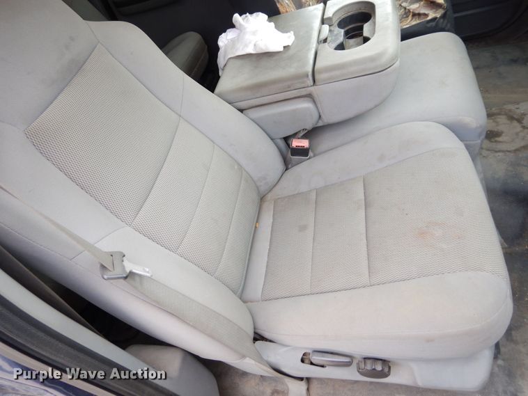 image for item JK9018 2006 Ford F550 Super Duty XLT  Crew Cab flatbed truck