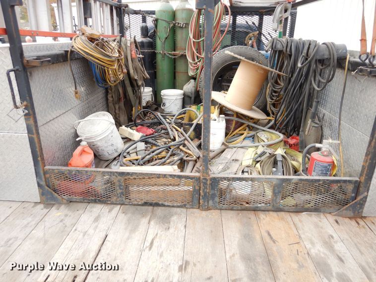 image for item JK9018 2006 Ford F550 Super Duty XLT  Crew Cab flatbed truck