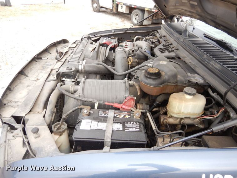 image for item JK9018 2006 Ford F550 Super Duty XLT  Crew Cab flatbed truck