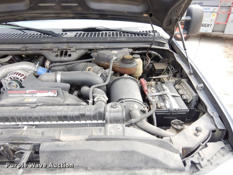 image for item JK9018 2006 Ford F550 Super Duty XLT  Crew Cab flatbed truck