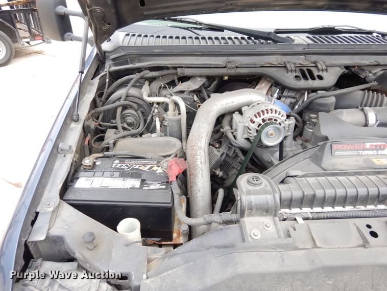 image for item JK9018 2006 Ford F550 Super Duty XLT  Crew Cab flatbed truck