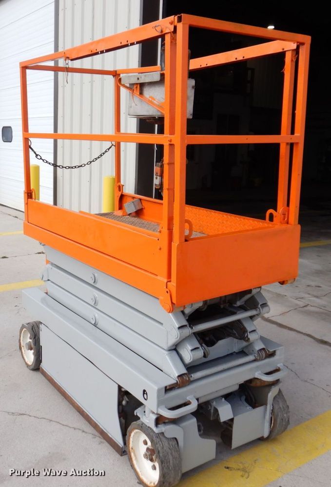 image for item JL9785 2004 Skyjack SJIII 3219  scissor lift