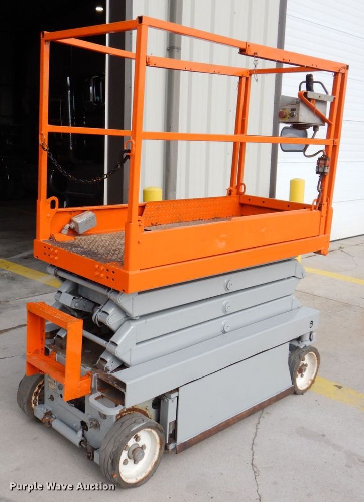 image for item JL9785 2004 Skyjack SJIII 3219  scissor lift
