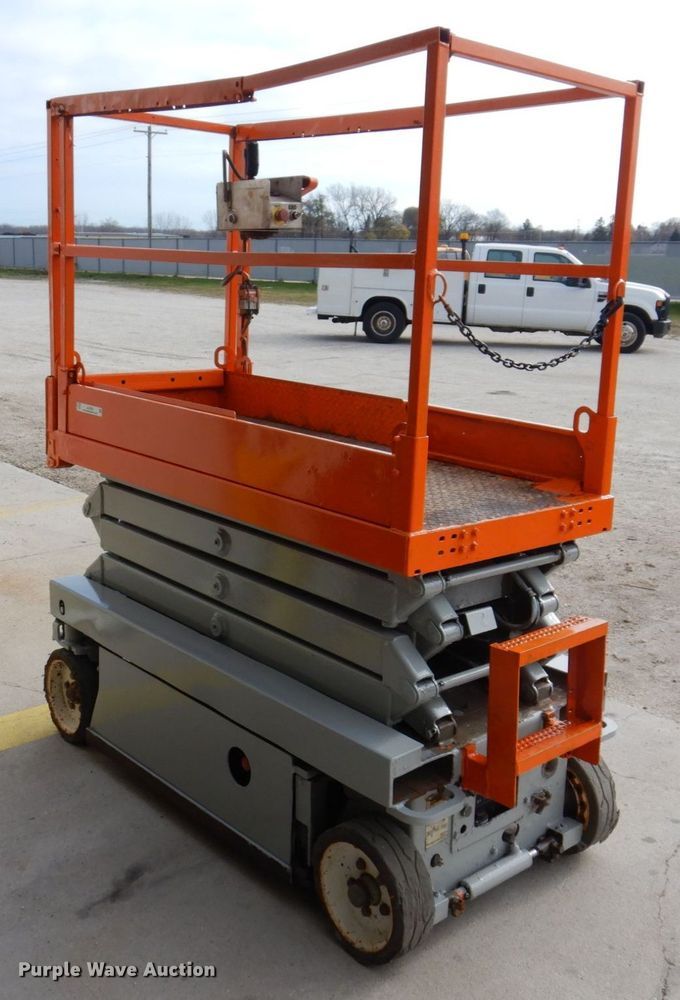 image for item JL9785 2004 Skyjack SJIII 3219  scissor lift