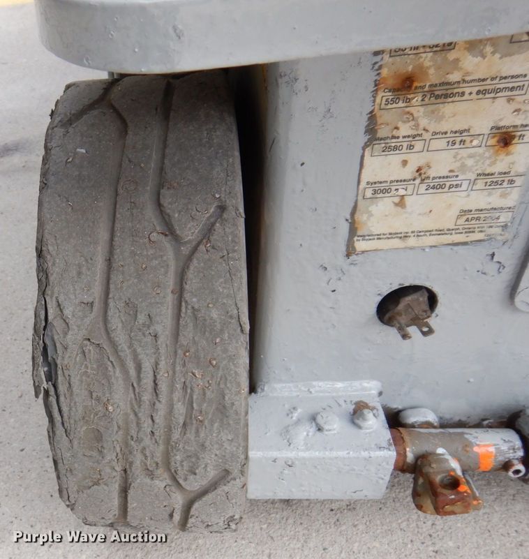 image for item JL9785 2004 Skyjack SJIII 3219  scissor lift