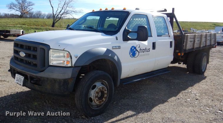 image for item JL9805 2005 Ford F550 Super Duty XL  Crew Cab flatbed truck