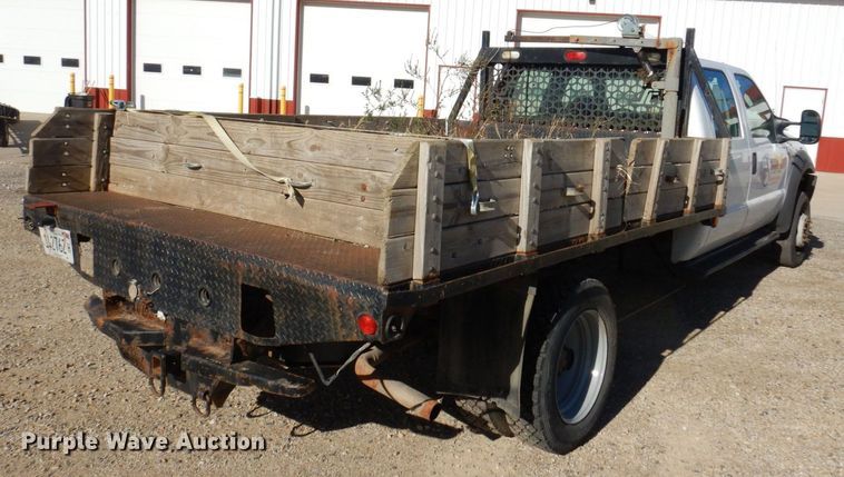 image for item JL9805 2005 Ford F550 Super Duty XL  Crew Cab flatbed truck