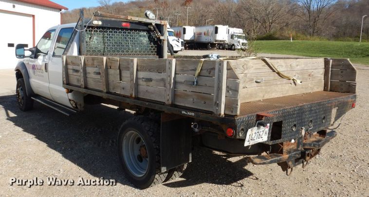 image for item JL9805 2005 Ford F550 Super Duty XL  Crew Cab flatbed truck