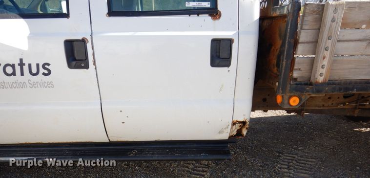 image for item JL9805 2005 Ford F550 Super Duty XL  Crew Cab flatbed truck